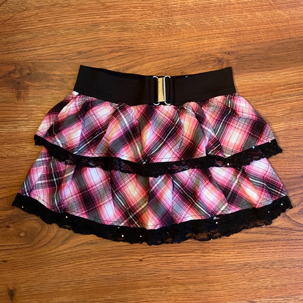 Justice pink, black plaid and lace buckle skirt